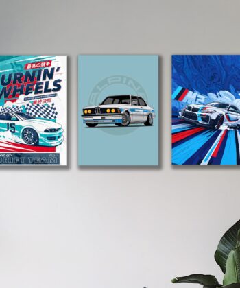 Text: A set of three vertical wall art tiles featuring a white drift car with "Burnin' Wheels" text, a vintage BMW-style car, and a modern