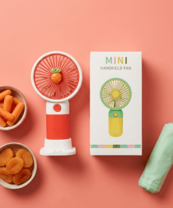 Mini Portable Handheld Fan With Desktop Base Cute Carrot Design Rechargeable Personal Cooling Fan.