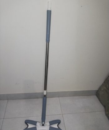 Rotating X Mop Flat Microfiber Floor Mop with 360 Degree Squeeze System and Replaceable Cloth Heads in Use