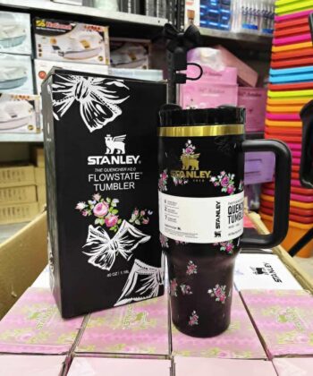 40 Oz Stanley X Coquette Tumbler available in Black, Pink, White, and Blue floral patterns.