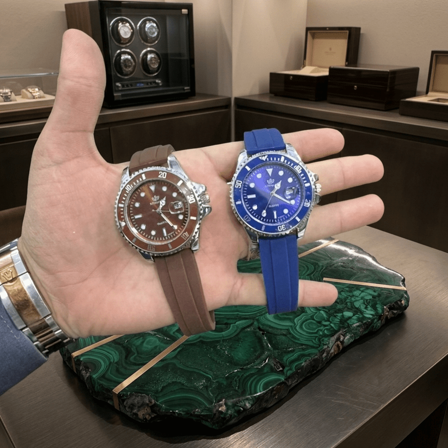 Apex Sports Luxury Collection Men's luxury sports watch with blue and brown silicone straps held in hand
