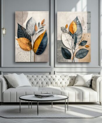 2-piece modern abstract leaf wall art set in navy, mustard, and gray colors on a gray wall.