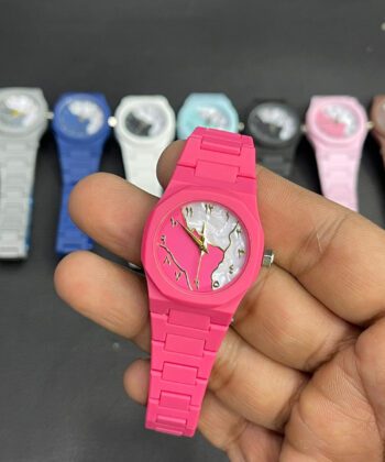Mini Aura minimalist women's watch available in pink, blue, black, and more.