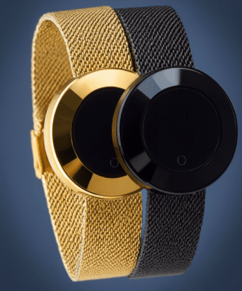 Minimalist ladies' smart watch with gold and black mesh straps and circular touch dial.