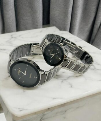 POSITIF matching couple watch set with black dials and silver link bracelets.