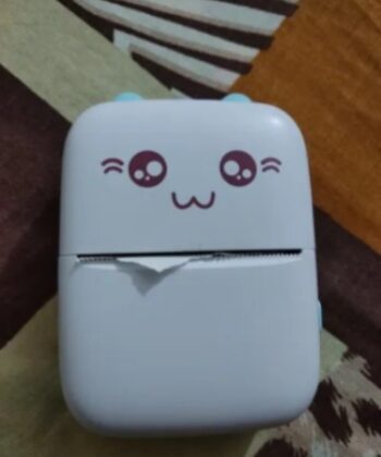 Wireless Bluetooth mini thermal printer showing inkless printing technology for labels and photos.