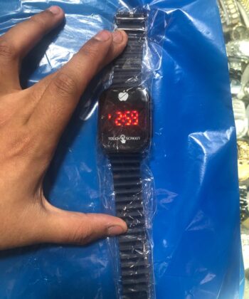 Blue digital touch watch with a glowing red LED display.