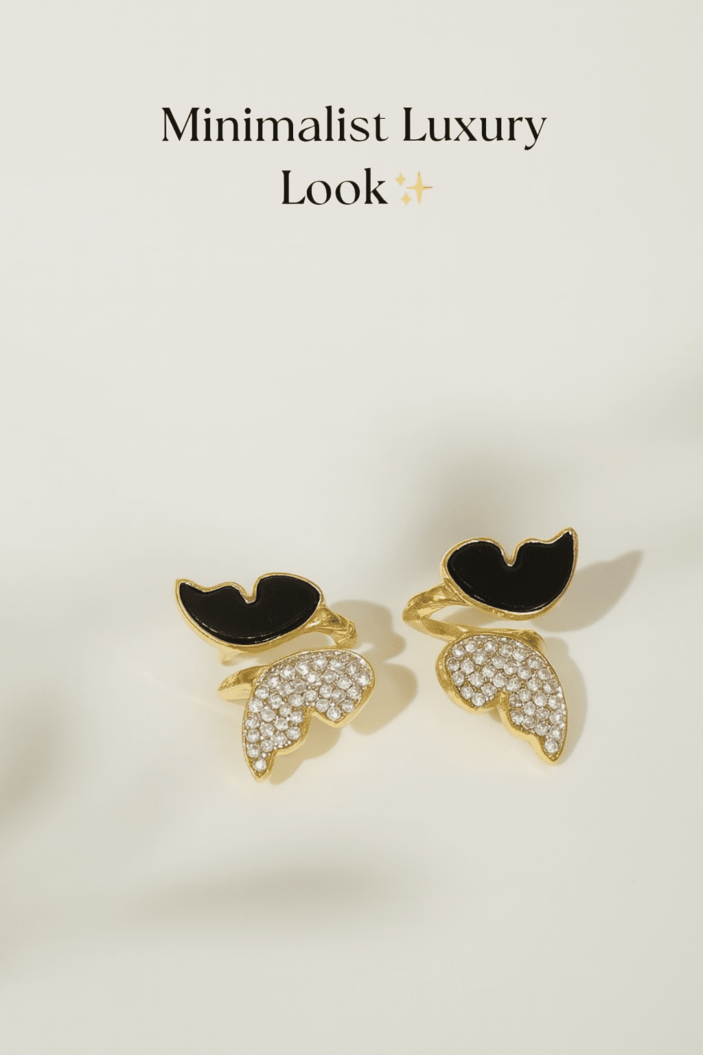 Zircon-Butterfly-Golden-Enamel-Earrings Close up of Zircon Butterfly Golden Stud Earrings with black enamel