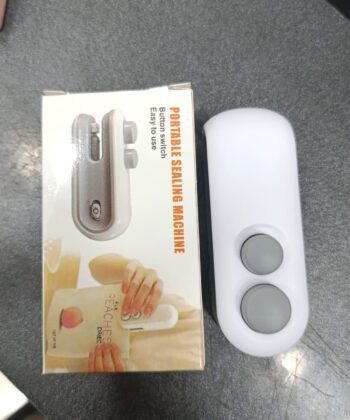 Handheld 2-in-1 rechargeable mini heat sealer and bag cutter for food preservation.