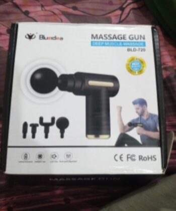 Professional deep tissue massage gun with 4 replaceable heads for muscle recovery.