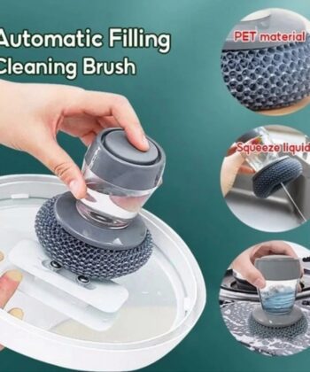 Kitchen soap dispensing palm brush for easy dish cleaning.